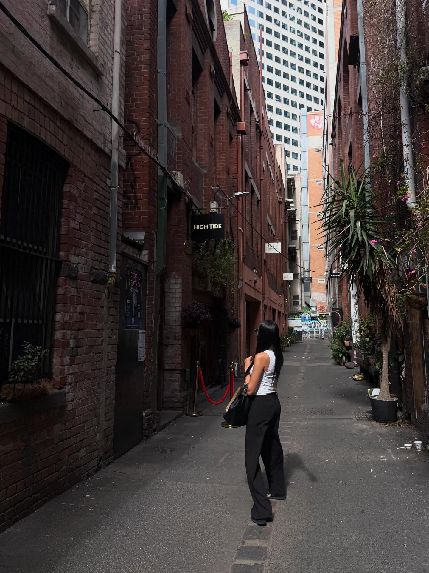 Sexologist Kiara Sasha photographed in a Melbourne laneway